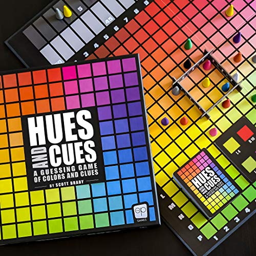 Componentes completos del juego de mesa Hues and Cues: tablero, cartas, fichas y caja