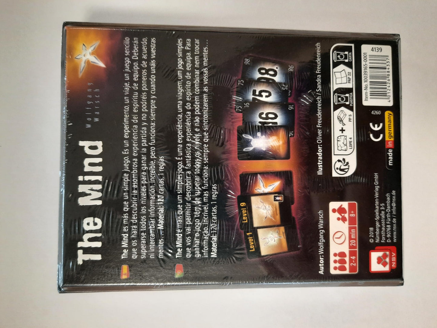 Parte trasera de la caja del juego de mesa The Mind con explicación y componentes