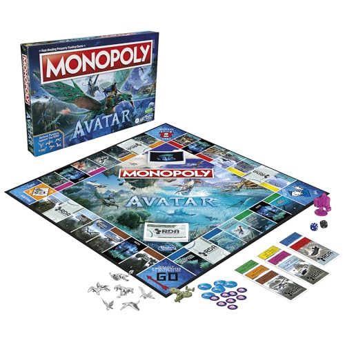 Componentes de Monopoly Avatar incluyendo tablero, cartas, fichas, dinero y caja