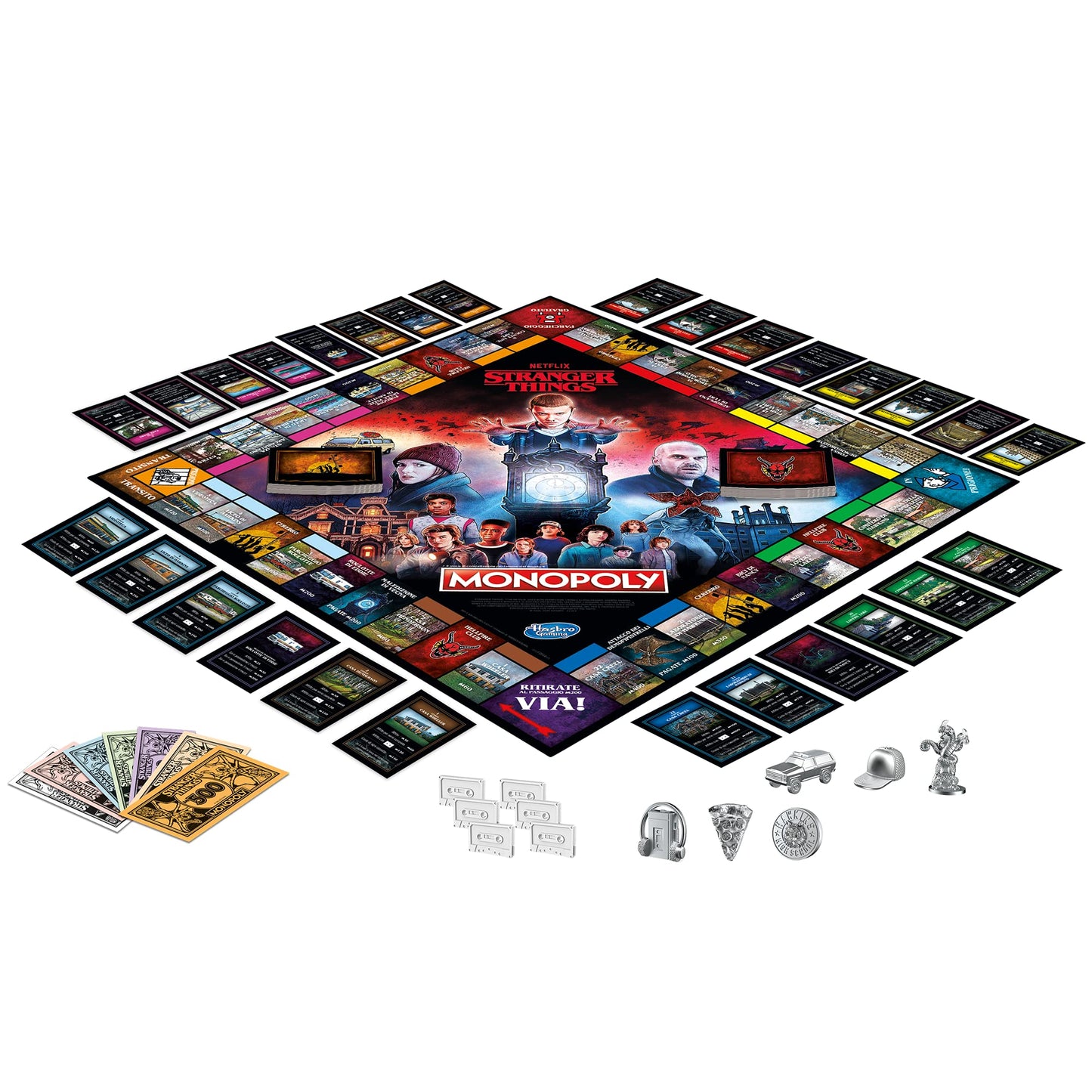 Componentes del Monopoly Stranger Things incluyendo tablero, cartas, fichas, dinero y caja