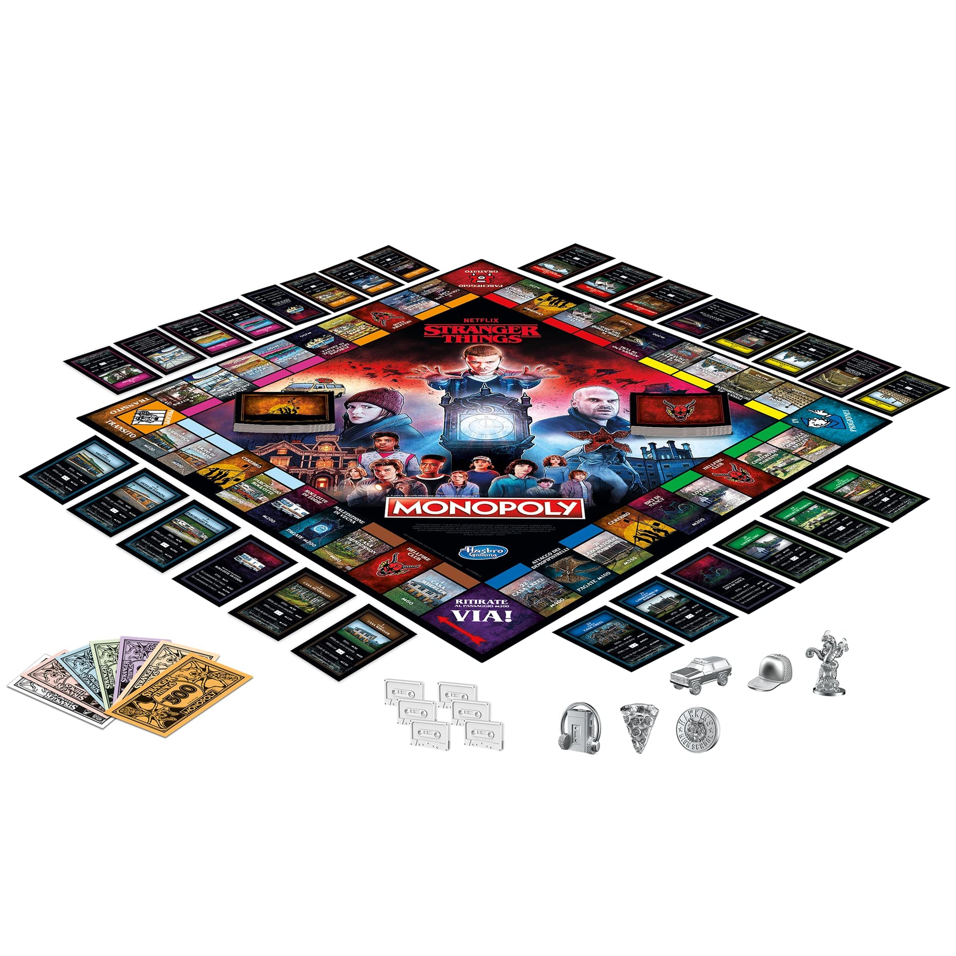 Componentes del Monopoly Stranger Things incluyendo tablero, cartas, fichas, dinero y caja